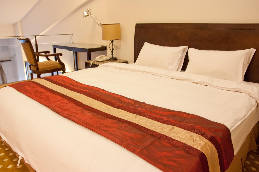 Les Hotel Тайнань Номер фото
